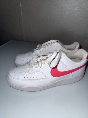Nike White Low-Top Sneakers with Pink Swoosh